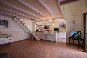 A kitchen or kitchenette at Guglielmo Tell Suite