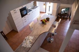 A kitchen or kitchenette at Guglielmo Tell Suite