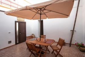 A patio or other outdoor area at Guglielmo Tell Suite