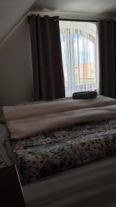 Postel nebo postele na pokoji v ubytování Apartmán Mikulov