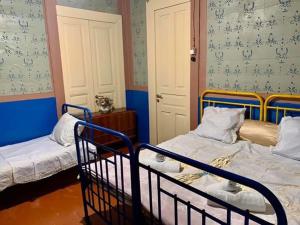 Postel nebo postele na pokoji v ubytování Martv'Elle Boutique Guesthouse