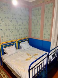 Postel nebo postele na pokoji v ubytování Martv'Elle Boutique Guesthouse