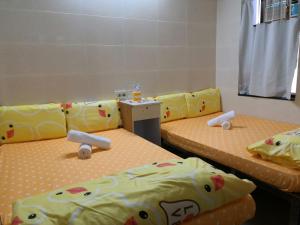 Postelja oz. postelje v sobi nastanitve Unique Hostel