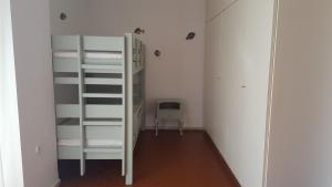 A bed or beds in a room at Seafront Villa Aggeliki