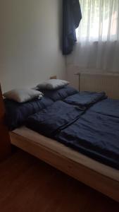 Łóżko lub łóżka w pokoju w obiekcie Bliss apartment