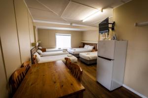 Ένα ή περισσότερα κρεβάτια σε δωμάτιο στο Ardeanal Motel