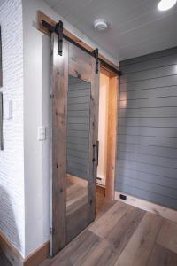a sliding barn door in a room at Scandia Inn in McCall