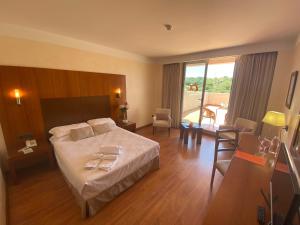 Postel nebo postele na pokoji v ubytování Hotel Montera Plaza