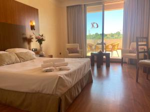 Postel nebo postele na pokoji v ubytování Hotel Montera Plaza