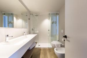 Koupelna v ubytování GoTì Hotel