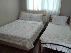 Postel nebo postele na pokoji v ubytování Santafe