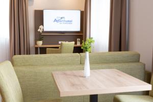 TV a/nebo společenská místnost v ubytování Aparthotel Am Pfaffenstein