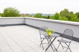 Balkón nebo terasa v ubytování Aparthotel Am Pfaffenstein