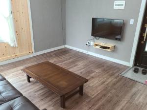 TV a/nebo společenská místnost v ubytování Santafe