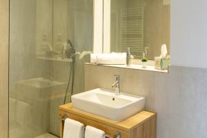 Koupelna v ubytování Aparthotel Am Pfaffenstein + 23 fotografií