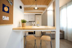 A kitchen or kitchenette at MiniLoft25