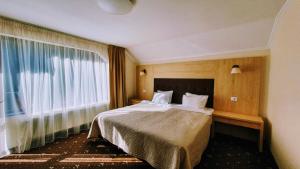 Fotografie z fotogalerie ubytování Carpatica Lodge v destinaci Moieciu de Sus + 37 fotografií