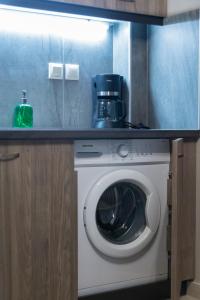 Kuchyňa alebo kuchynka v ubytovaní Nora's Home Kalamata