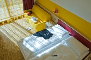 Voodi või voodid majutusasutuse Garda Sporting Club Hotel toas