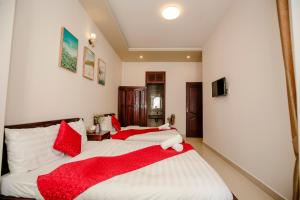 Letto o letti in una camera di Conico Đà Lạt Hotel