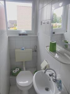 Koupelna v ubytování Pension An der Reling