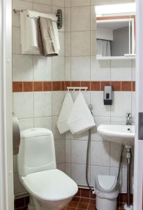 Kylpyhuone majoituspaikassa Hotelli Sointula
