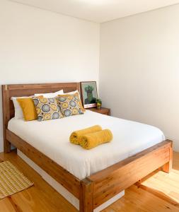 Postel nebo postele na pokoji v ubytování Guest House Arca de Água