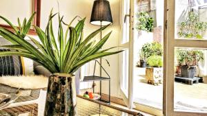 Ein Sitzbereich in der Unterkunft BizFlats Garden House