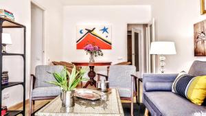 Ein Sitzbereich in der Unterkunft BizFlats Garden House