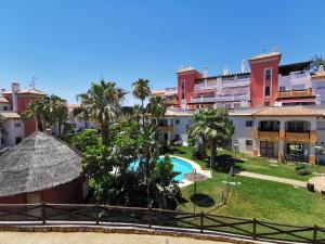 desde el balcón de un complejo con piscina en Apartamento Hierro 9 Golf, en Caleta de Vélez
