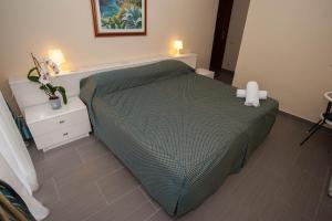 Letto o letti in una camera di HOTEL POSTA Dépendance