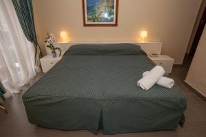 Letto o letti in una camera di HOTEL POSTA Dépendance
