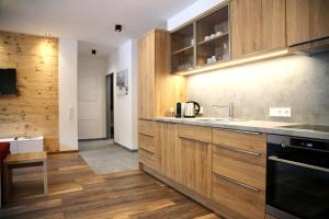 Kuchyň nebo kuchyňský kout v ubytování Apartment Bacher