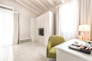 TV a/nebo společenská místnost v ubytování Hotel Stella Della Versilia