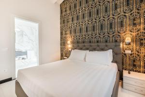 Postel nebo postele na pokoji v ubytování Hotel Stella Della Versilia