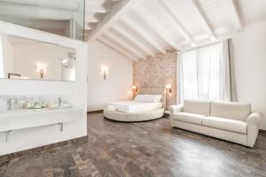 Postel nebo postele na pokoji v ubytování Hotel Stella Della Versilia