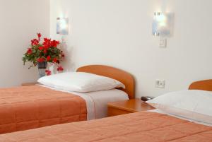 Cama o camas de una habitación en Guesthouse Bajc