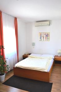 Cama o camas de una habitación en Guesthouse Bajc