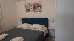 Postel nebo postele na pokoji v ubytování Irena