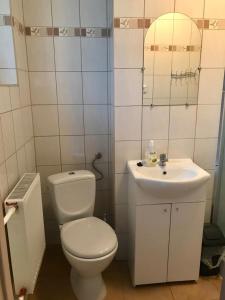 Kúpeľňa v ubytovaní Karwia Pokoje & Apartamenty