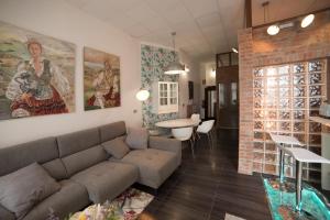 Posezení v ubytování Apartamento de lujo en Gijòn