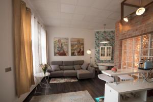 Posezení v ubytování Apartamento de lujo en Gijòn + 30 fotografií