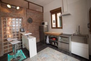 Kuchyň nebo kuchyňský kout v ubytování Apartamento de lujo en Gijòn