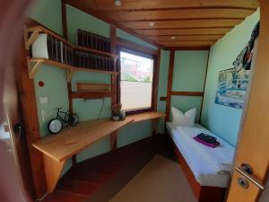 Ένα ή περισσότερα κρεβάτια σε δωμάτιο στο Ferienhaus Altstadt