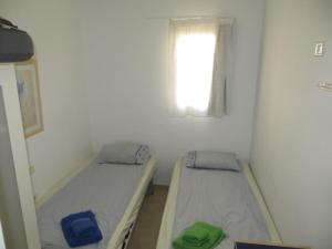 Postel nebo postele na pokoji v ubytování Playa De Mogan Mirador 15