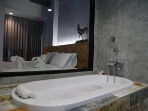 Koupelna v ubytování OU HOTEL