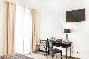 TV a/nebo společenská místnost v ubytování Hotel Stella Della Versilia