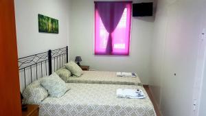 Postel nebo postele na pokoji v ubytování Apartamento Study 1 Select Real Caldas de Reis