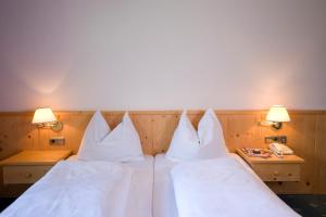 Postel nebo postele na pokoji v ubytování Hotel Panorama