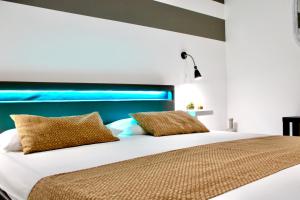 A bed or beds in a room at Apartment Omnia